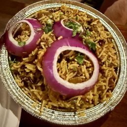 Himalayan Kitchen signature dishes Goat BiryaniTandoori Tangri ChickenChicken Tikka Pizza